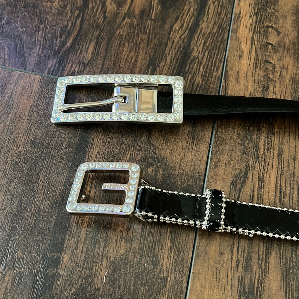 Two Black Belts With Jewel Encrusted Belt Buckles